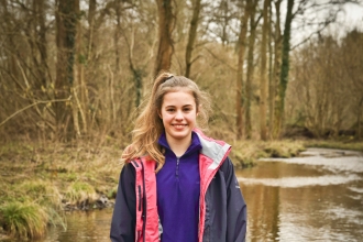 Issy standing in a river