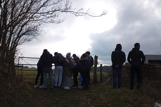 Refugee group looking at the view