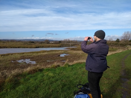 Andy Karran filming his St Bride's Wentlooge to Peterstone virtual walk event