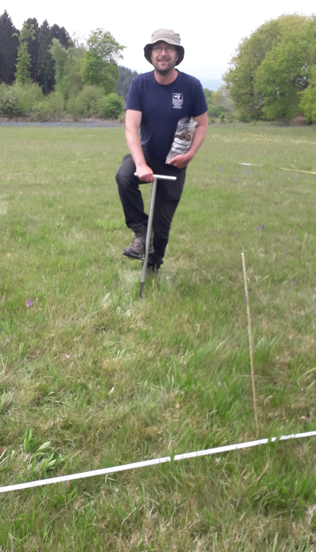 Andy Karran collecting soil samples for eDNA