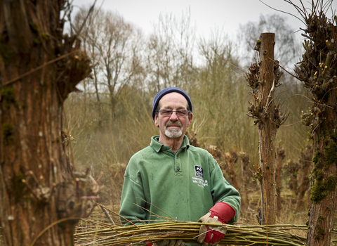 Malcolm volunteering on a reserve