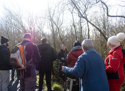 Wild Health project officer Ian Thomas (in the centre/facing) leading a nature walk